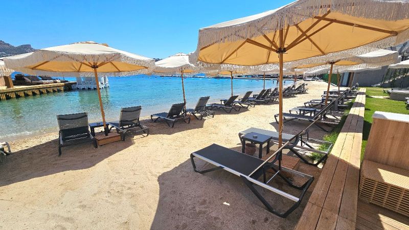 Bodrum Yalıkavakta Satılık Denize Sıfır özel Kum Plajlı Site içinde Eşyalı 4+1 Rezidans Daire