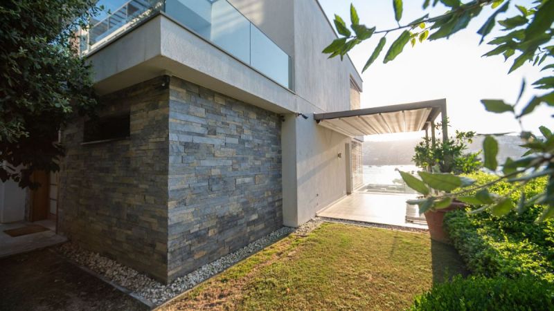 Bodrum Gündoğanda Satılık Denize Sıfır özel Plajlı sitede özel Havuzlu Deniz Manzaralı 5+1 Villa