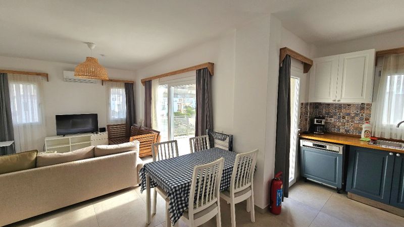 Bodrum Gümüşlükte Satılık Havuzlu sitede eşyalı 2+1 üst kat daire