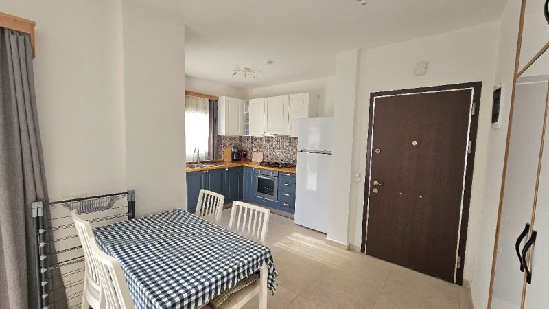 Bodrum Gümüşlükte Satılık Havuzlu sitede eşyalı 2+1 üst kat daire